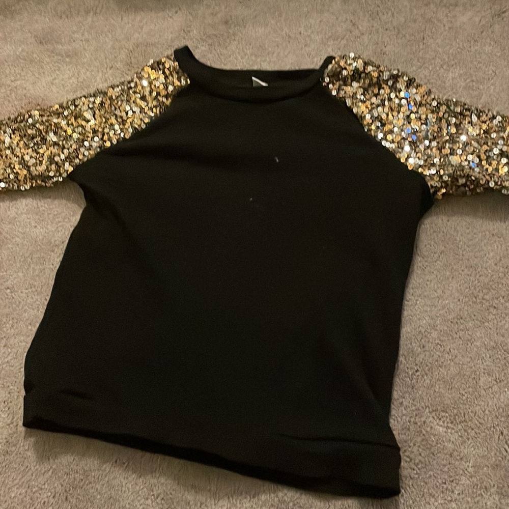 Black shirt with glittery sleeves